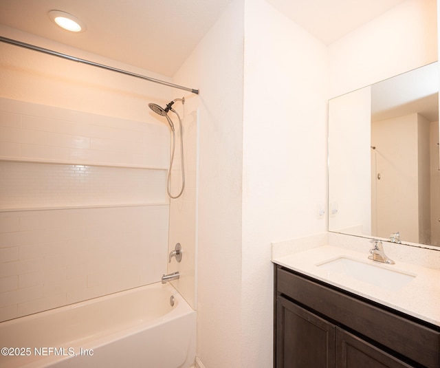 bathroom with vanity and tub / shower combination