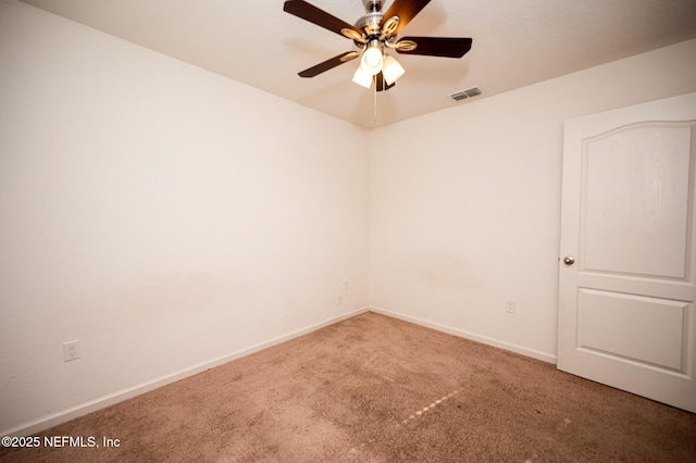 unfurnished room featuring carpet flooring and ceiling fan