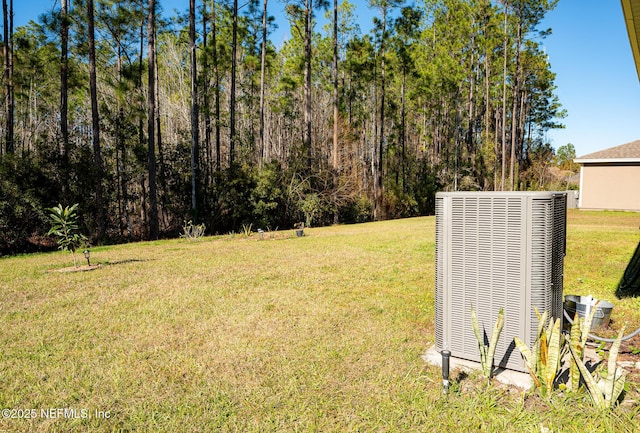 view of yard featuring central AC unit