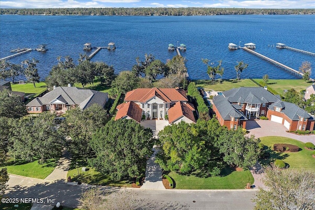 birds eye view of property featuring a water view