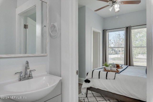 bathroom featuring vanity and ceiling fan