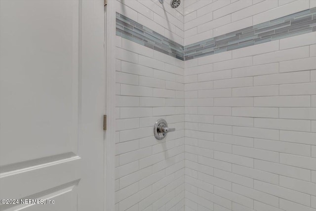 room details with a tile shower