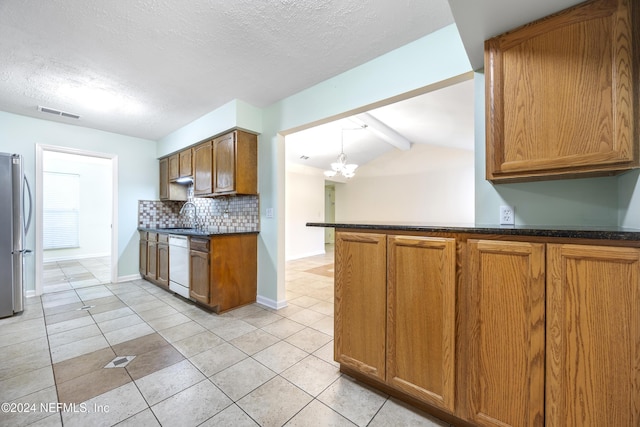 kitchen with white dishwasher, decorative light fixtures, stainless steel fridge, tasteful backsplash, and a notable chandelier