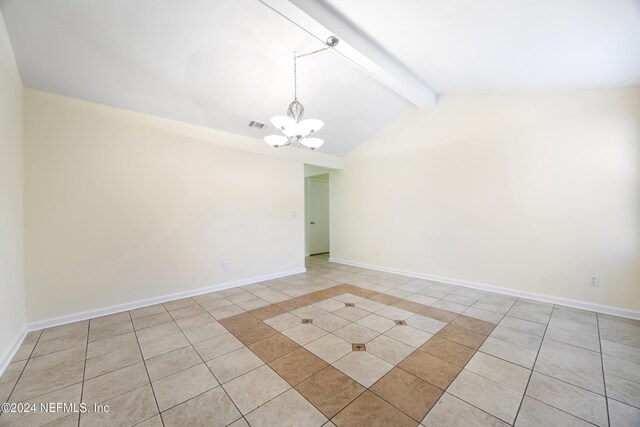 tiled empty room with lofted ceiling with beams and an inviting chandelier