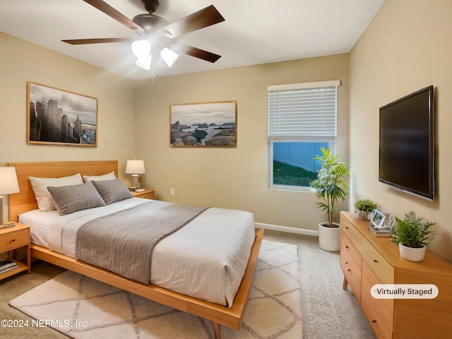 bedroom featuring carpet and ceiling fan