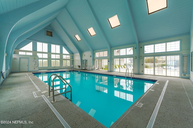 view of swimming pool featuring a patio area and sink