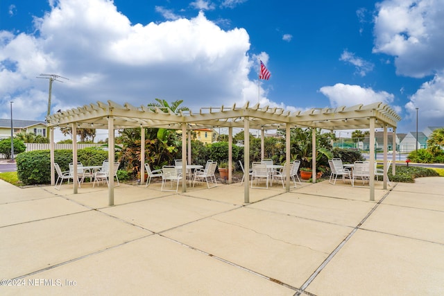 view of home's community featuring a patio area and a pergola