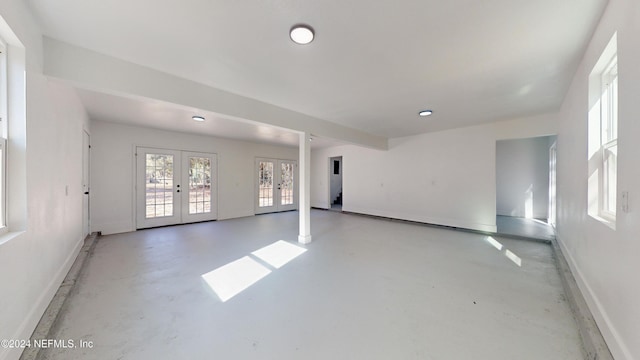 4774 Leopard Cir, Middleburg, FL 32068 - empty room with finished concrete flooring and french doors