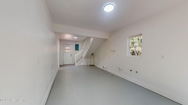 4774 Leopard Cir, Middleburg, FL 32068 - spare room featuring concrete flooring and stairs