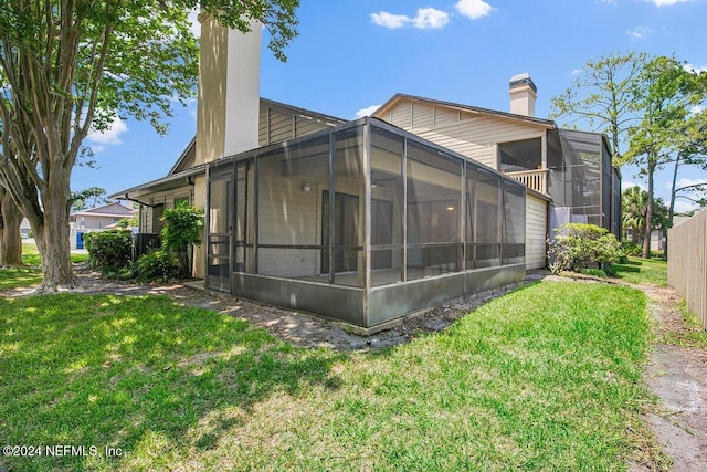 view of home's exterior featuring a lawn