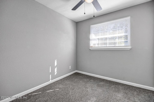 unfurnished room featuring carpet flooring and ceiling fan