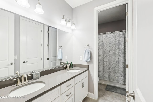 bathroom with tile patterned flooring, toilet, vanity, and a shower with shower curtain