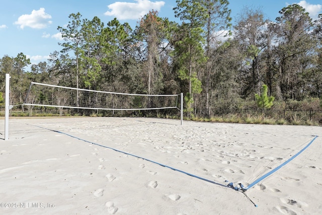 view of property's community featuring volleyball court