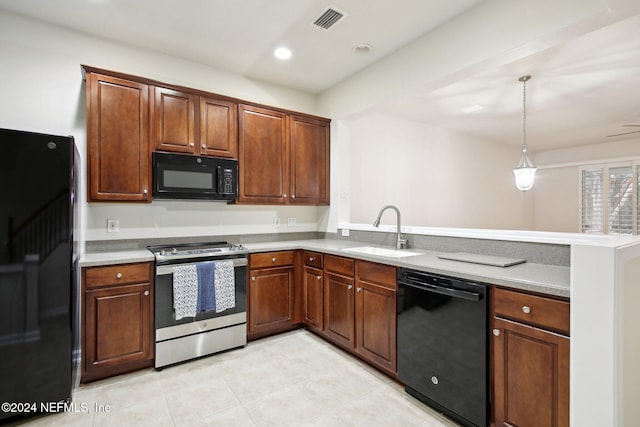 kitchen with black appliances, sink, ceiling fan, decorative light fixtures, and kitchen peninsula