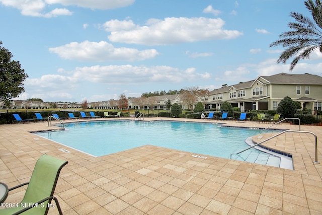 view of pool with a patio