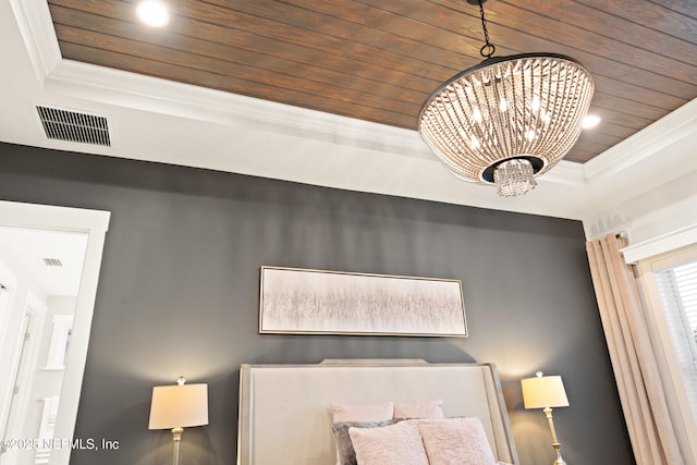 bedroom featuring a chandelier, visible vents, wood ceiling, and a tray ceiling
