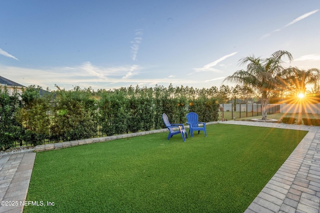 view of yard with a fenced backyard