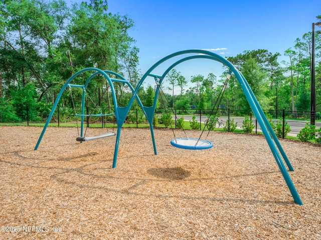 community play area featuring fence