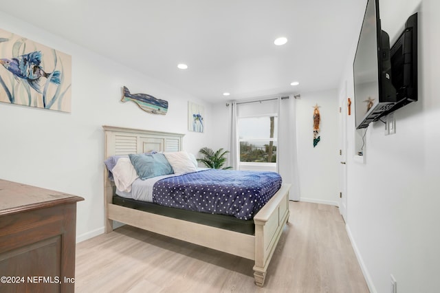 bedroom featuring light hardwood / wood-style flooring