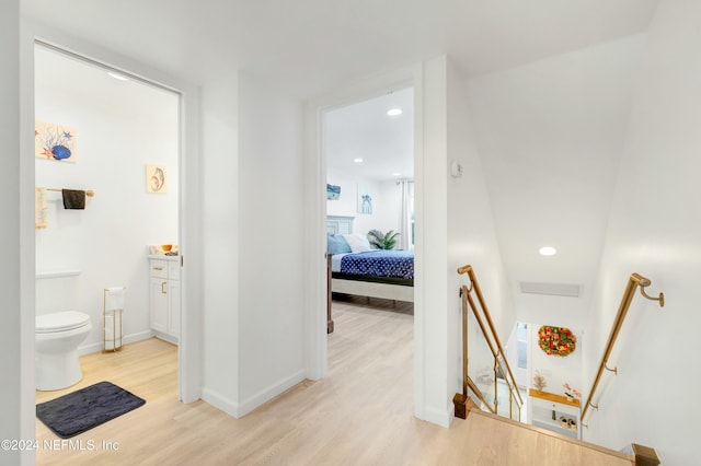 hallway with light wood-type flooring