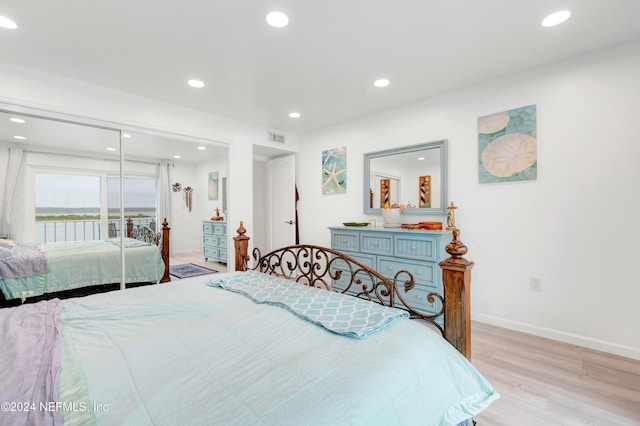 bedroom featuring light hardwood / wood-style floors