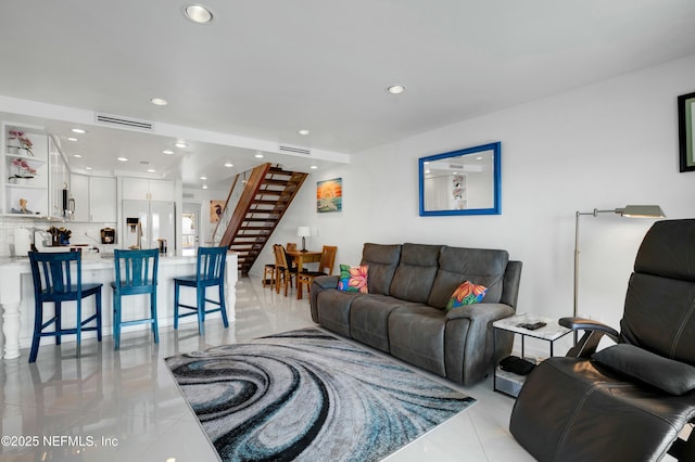 living room with light tile patterned floors