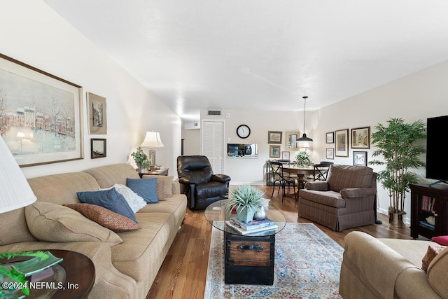 living room with hardwood / wood-style flooring