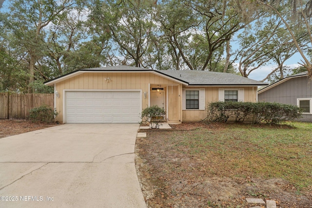 ranch-style house featuring a garage