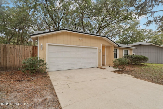 ranch-style house featuring a garage