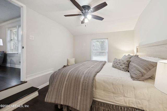 bedroom featuring vaulted ceiling and ceiling fan