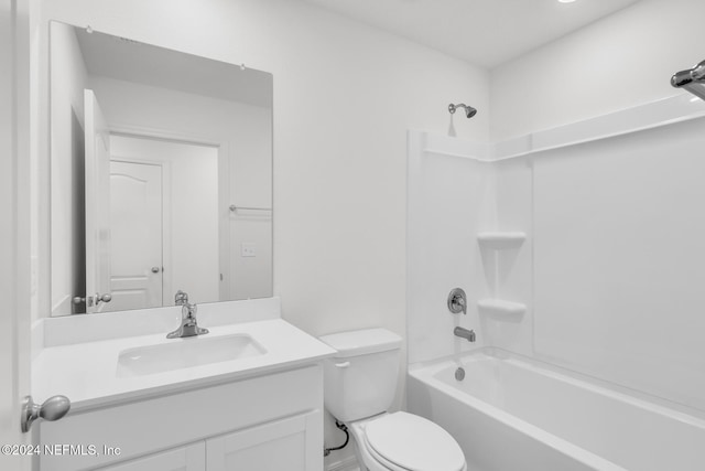 full bathroom featuring vanity, shower / bathtub combination, and toilet