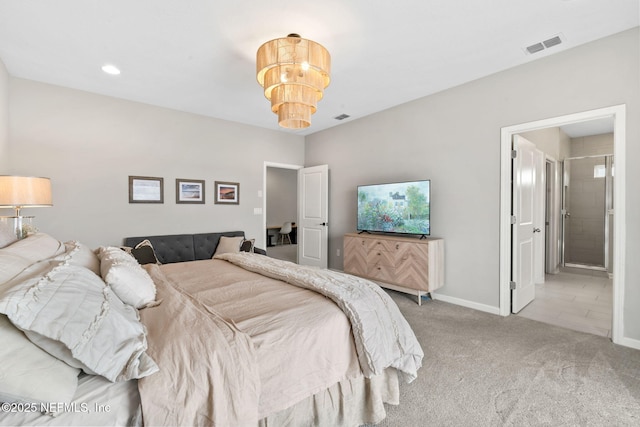 bedroom featuring light carpet, a notable chandelier, and ensuite bath