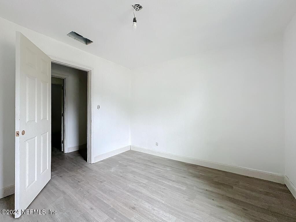 empty room featuring light wood-type flooring