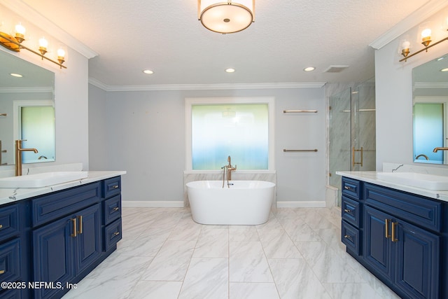 bathroom featuring a textured ceiling, separate shower and tub, crown molding, and vanity