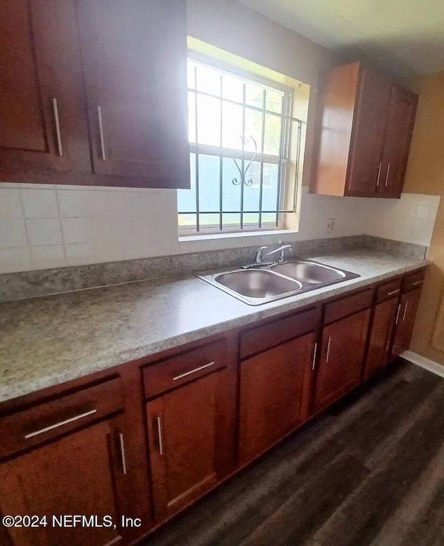 kitchen with dark hardwood / wood-style floors and sink