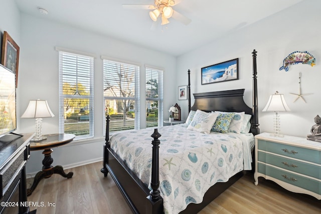 bedroom featuring ceiling fan and hardwood / wood-style floors