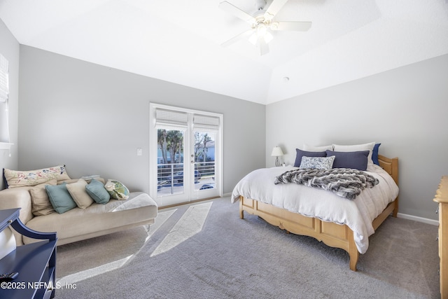 bedroom with access to outside, a raised ceiling, ceiling fan, and carpet