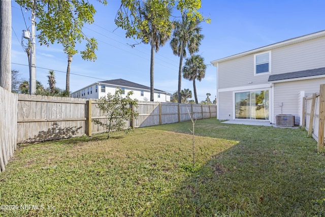 view of yard featuring central AC