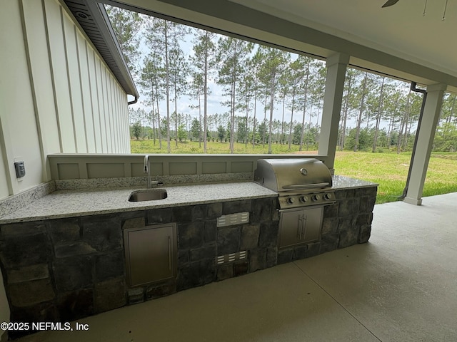 36199 Pitch Ln, Hilliard, FL 32046 - view of patio with a sink, ceiling fan, and view of scattered trees