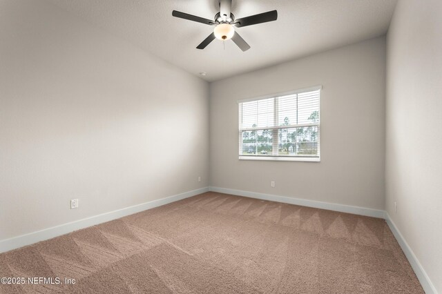 36199 Pitch Ln, Hilliard, FL 32046 - spare room with light colored carpet, a ceiling fan, and baseboards