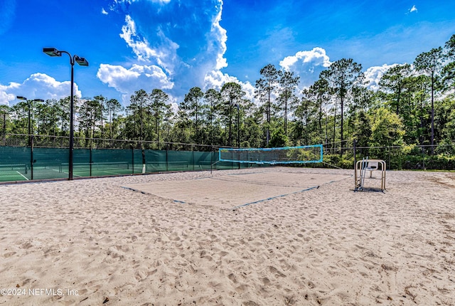 view of property's community featuring volleyball court