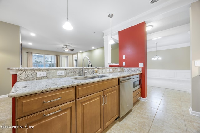 kitchen featuring decorative light fixtures, dishwasher, sink, and ceiling fan with notable chandelier