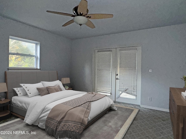 carpeted bedroom with access to exterior and ceiling fan