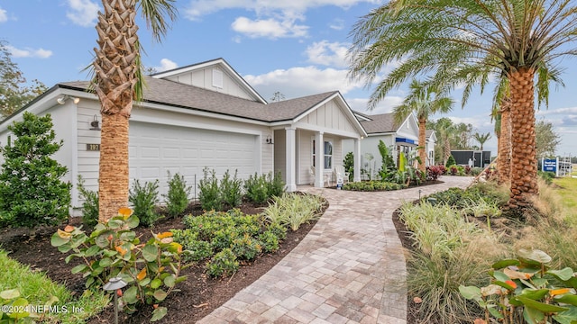 view of front of property with a garage