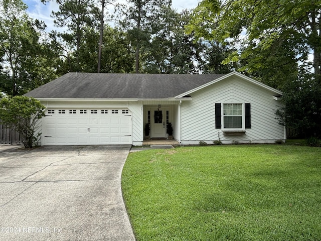 single story home with a garage and a front yard