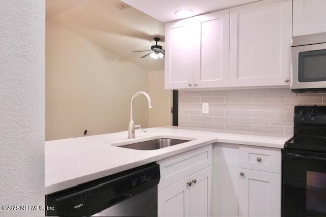 kitchen with white cabinets and stainless steel appliances