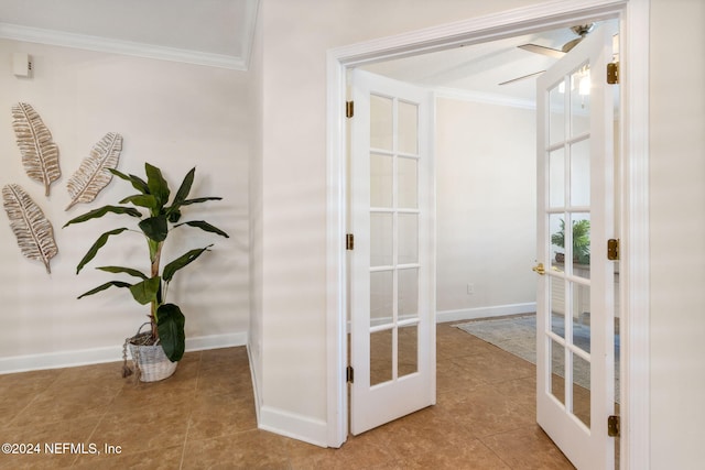 interior space with light tile patterned floors, ornamental molding, and french doors