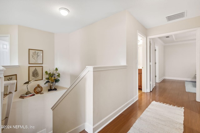 corridor featuring hardwood / wood-style flooring