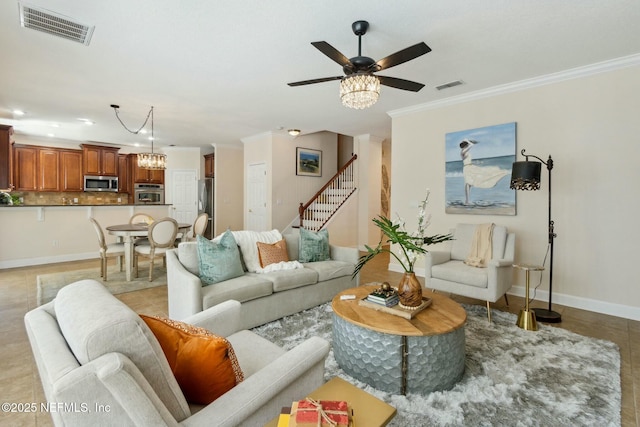 living area featuring visible vents, baseboards, crown molding, and stairway