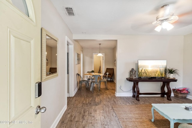 hall featuring dark hardwood / wood-style floors